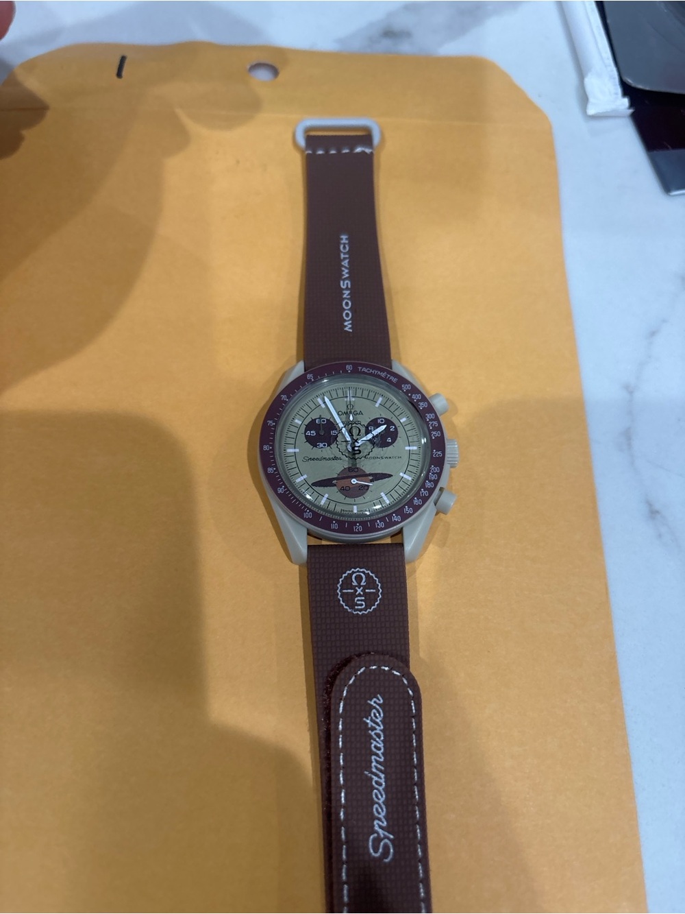 Omega MoonSwatch Beige Dial with Brown Bezel and Strap - Picture 4 of 4